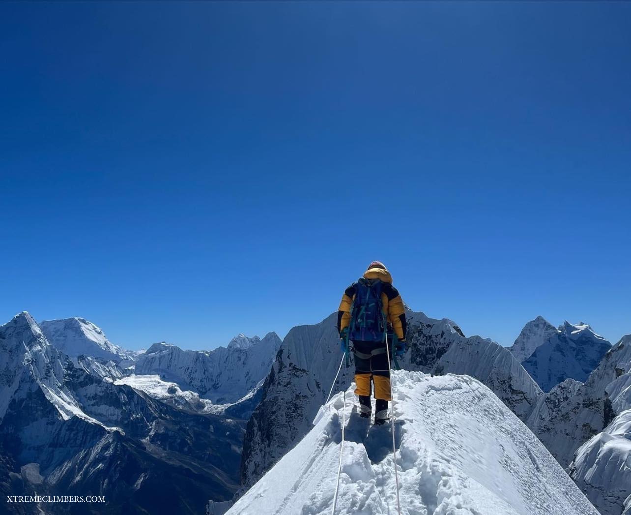 Scenic Landscape from Everest Three Pass Trek: Dramatic Mountains and Clear Blue Sky